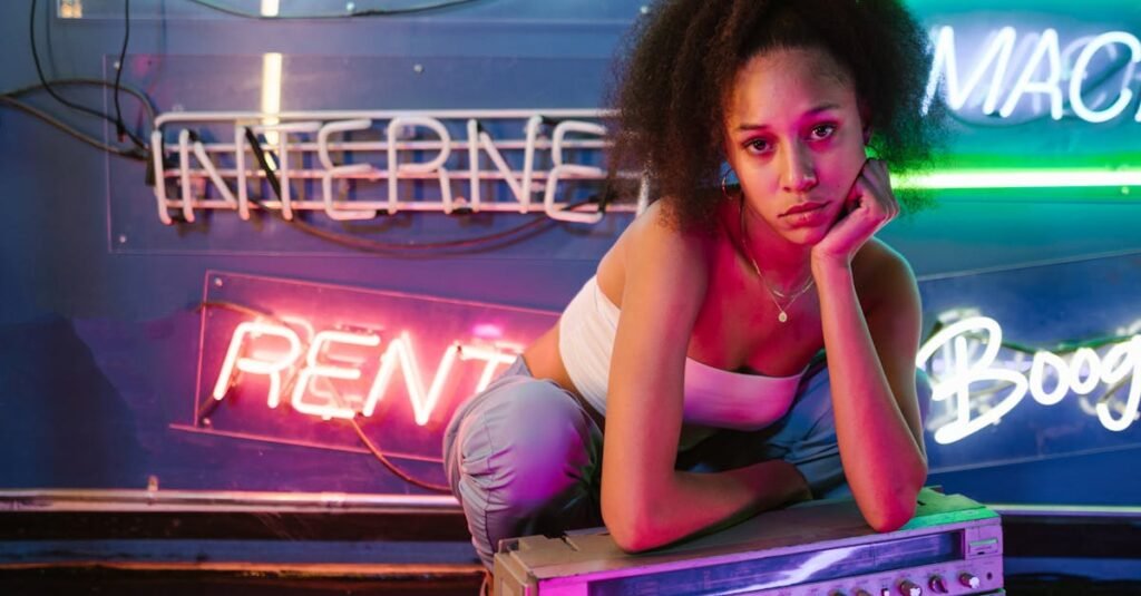 Young woman in a neon-lit room with a vintage boombox, embodying vibrant nightlife and urban culture.